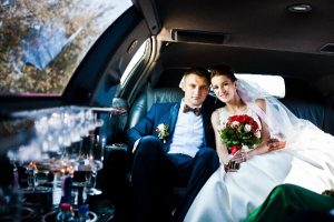 wedding couple inside their wedding limo service