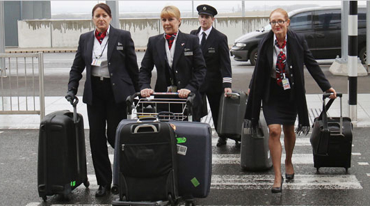 pilot and stewardesses heading to airport using airline crew transportation chicago