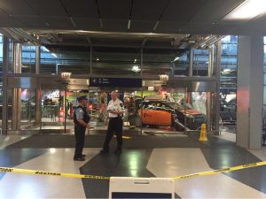 Taxi Cab Crashes Into O'Hare Airport Doorway