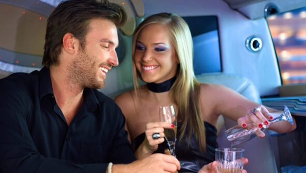 a happy couple promoting ways to spoil your wife is to have a limousine tour for trip dinner date