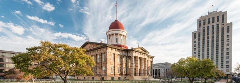 Historic building with red dome and columns promoting Limo Service Springfield IL